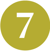 A white number 7 on a yellow circle background